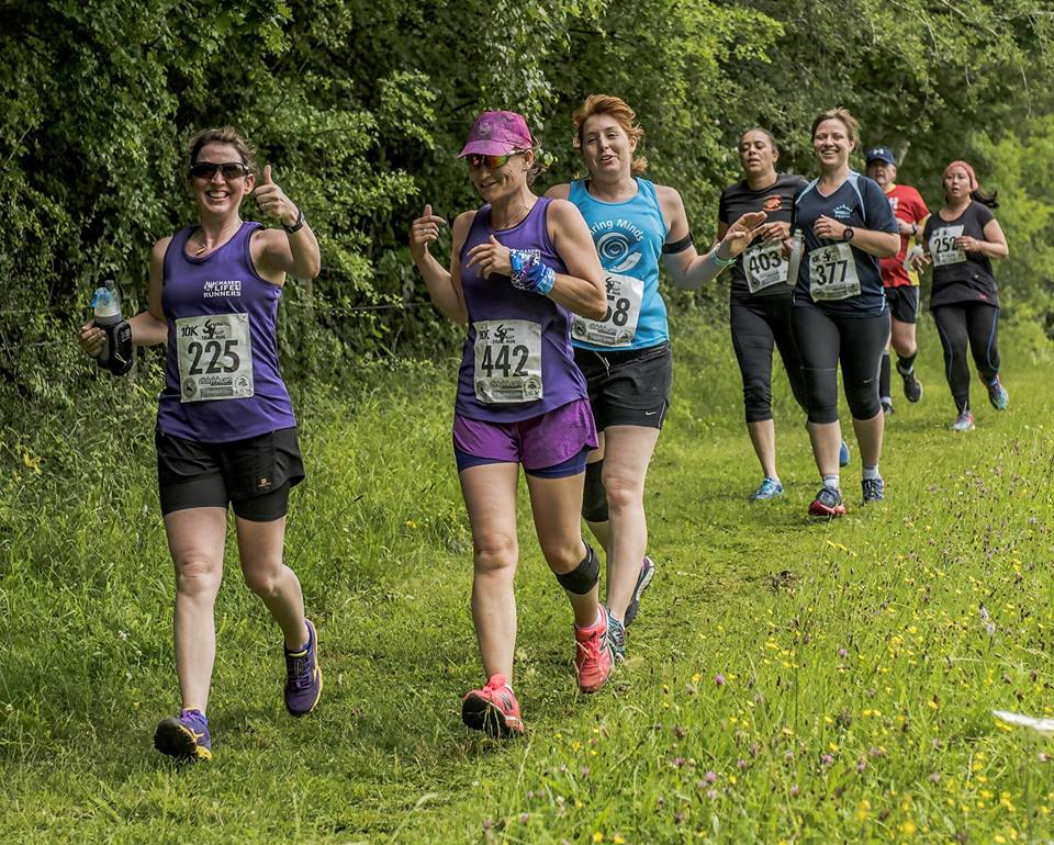 People on a trail run