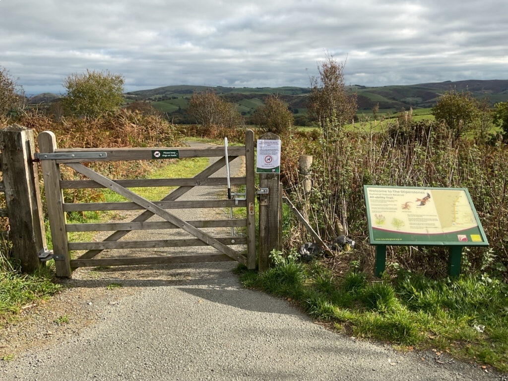 Photo showing an access gate at The Knolls that leads to the easy access route.