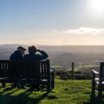 Couple sitting on a bench at Clee Hill