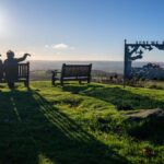 Couple sitting on a bench at Clee Hill