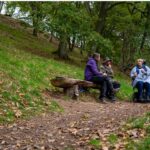 3 people sitting on a bench in Darnford valley