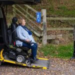lady in wheelchair in accessible parking space Darnford valley shropshire