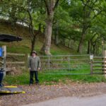 Man with lady in wheelchair in accessible parking space Darnford valley shropshire