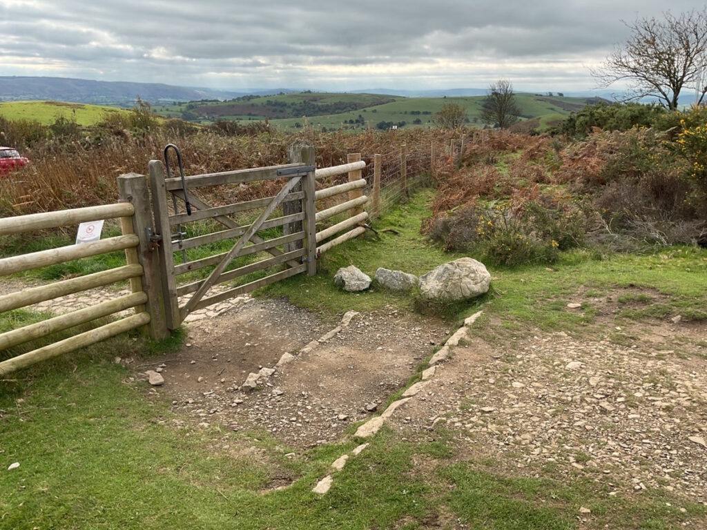 Photo showing an access gate that leads to the ridge at The Knolls.