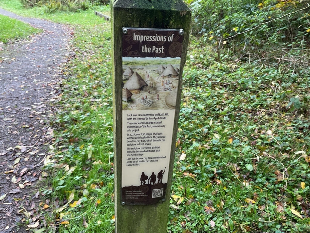 Photo of an interpretation board at the Poles Coppice viewpoint for the Impressions of the Past Project.