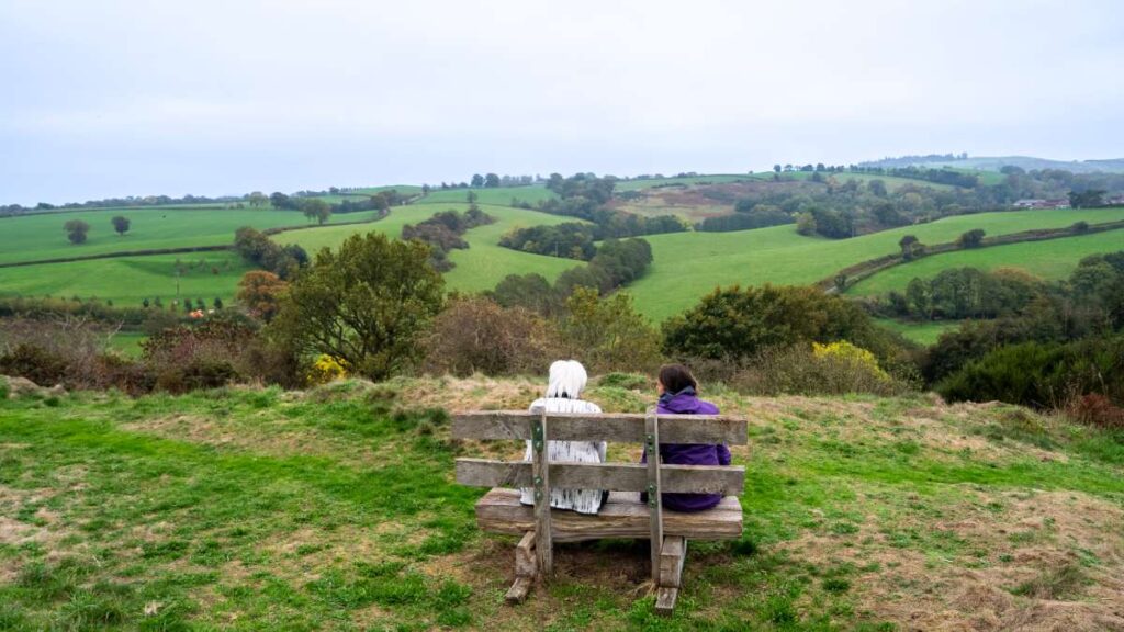 Two ladies looking at the view from a bench at Castle Pulverbach