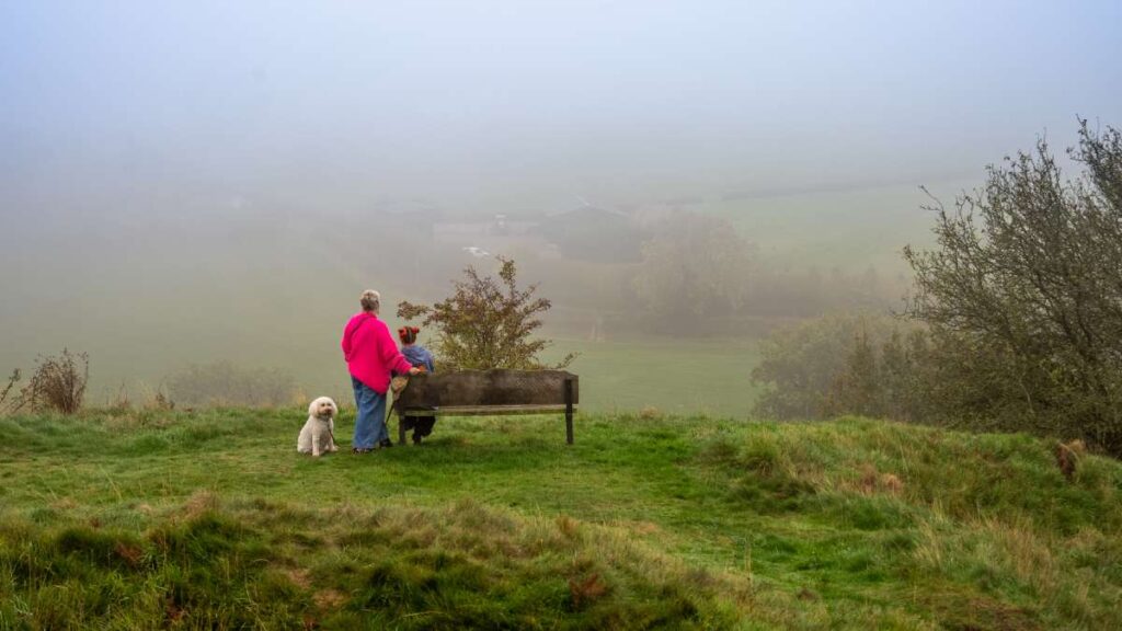2 ladies looking at the view from a bench at Castle Pulverbach