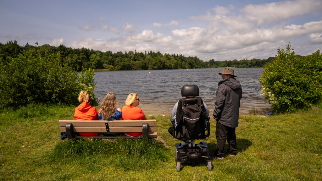 visitor looking at a lake